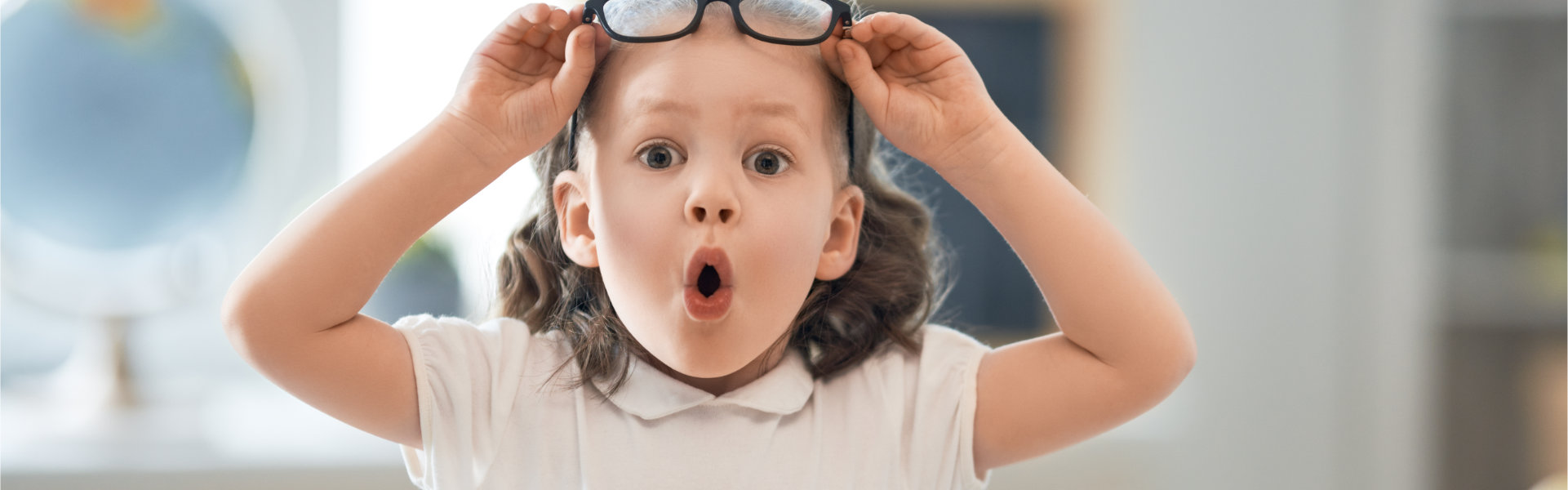 Young girl with glasses.